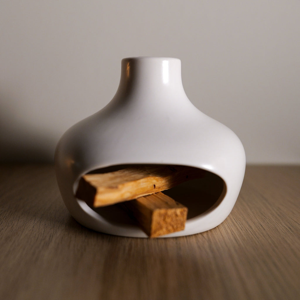 White ceramic Palo Santo burner with palo santo 